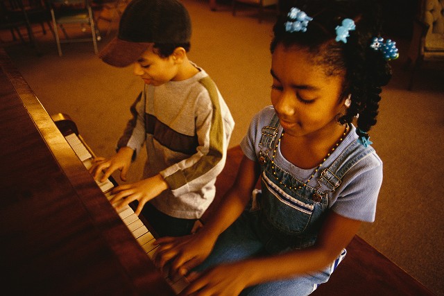 Children Playing Piano